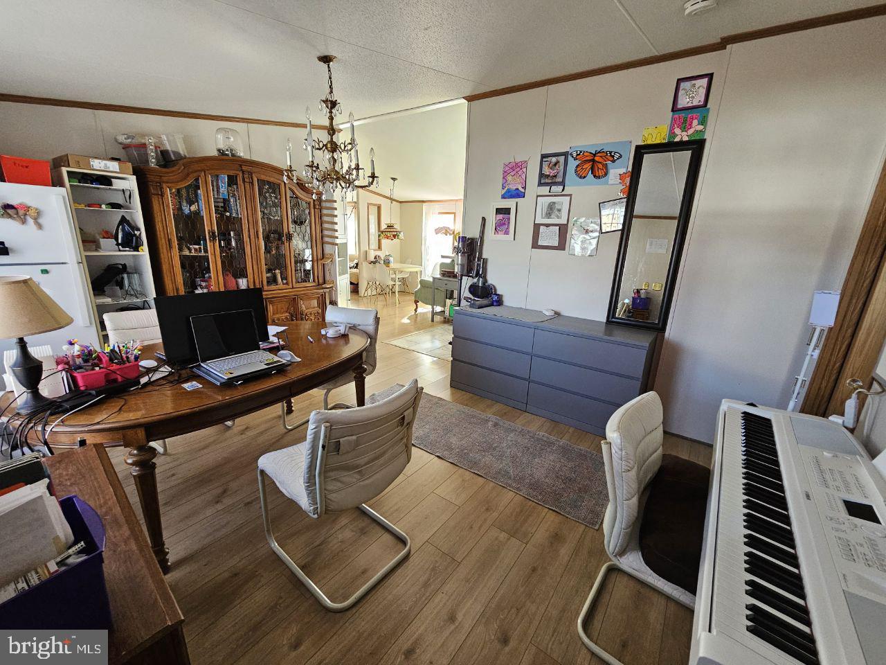 2304 Brownsville Road, Unit L22 Feasterville-Trevose, PA 19053 - Photo 10 of 22 a living room with furniture and a flat screen tv