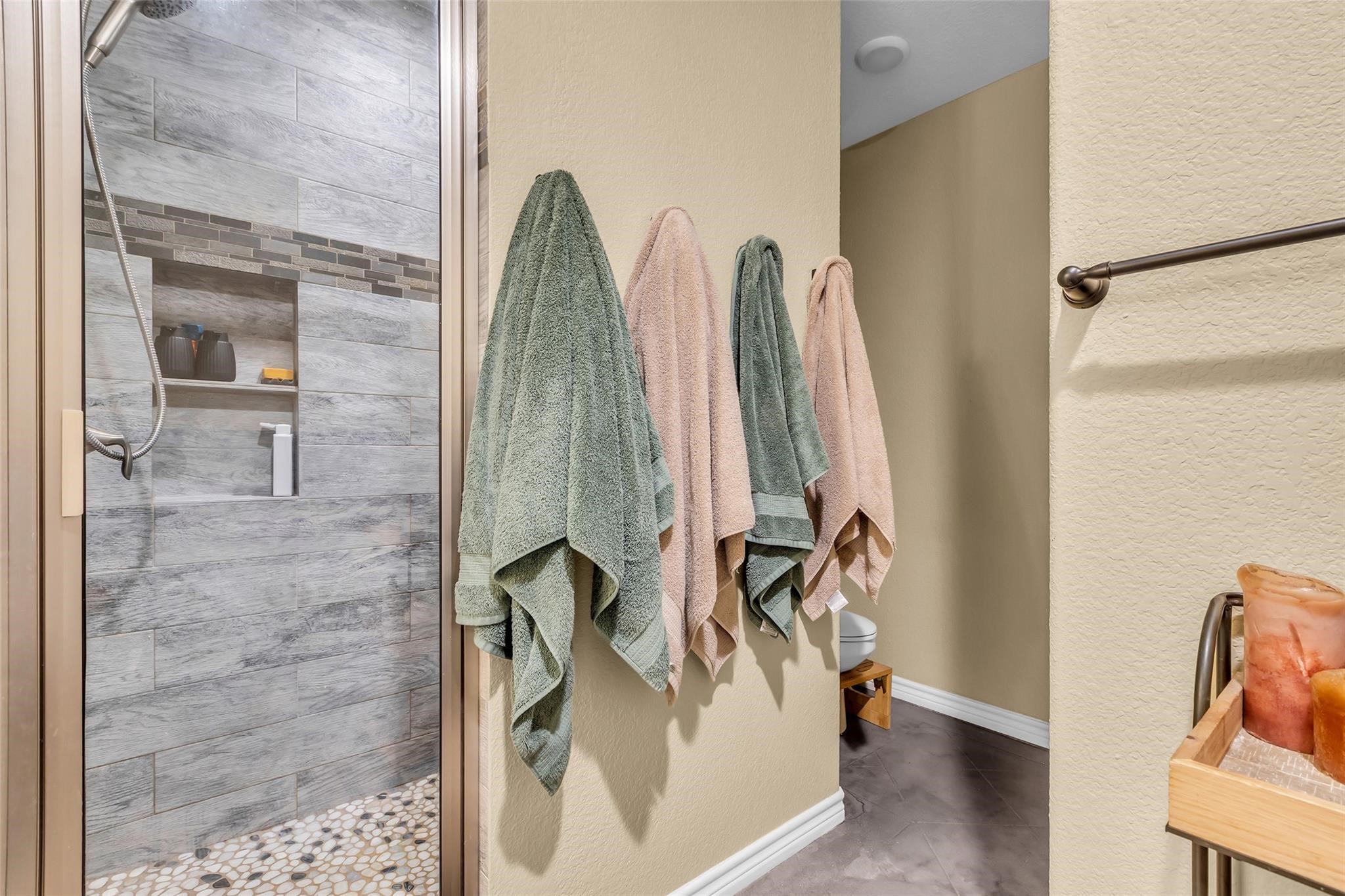 696 Independence Road Shepherd, TX 77371 - Photo 14 of 27 a view of walk in closet with clothes and shoes