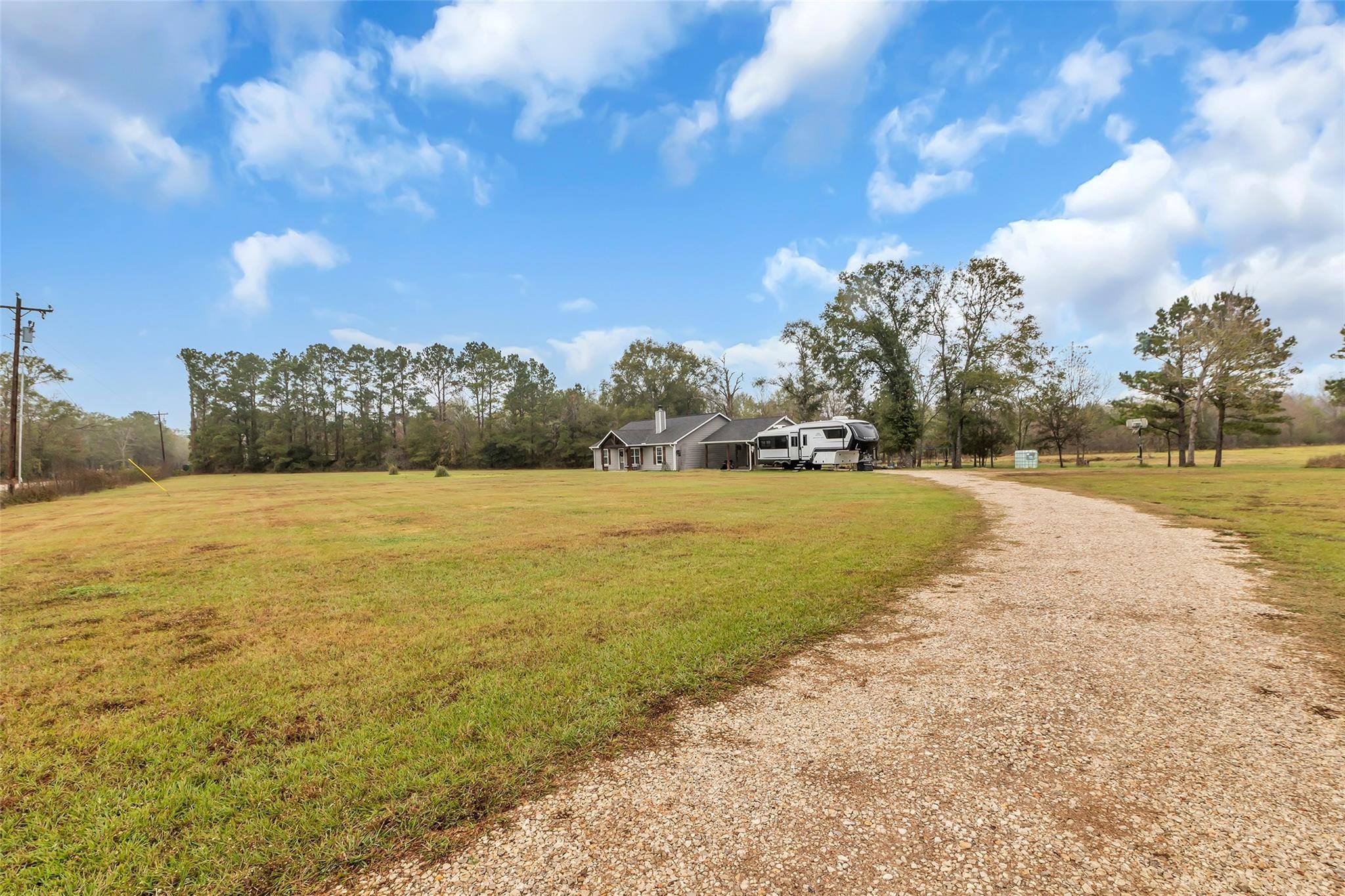696 Independence Road Shepherd, TX 77371 - Photo 23 of 27 a view of yard with ocean view