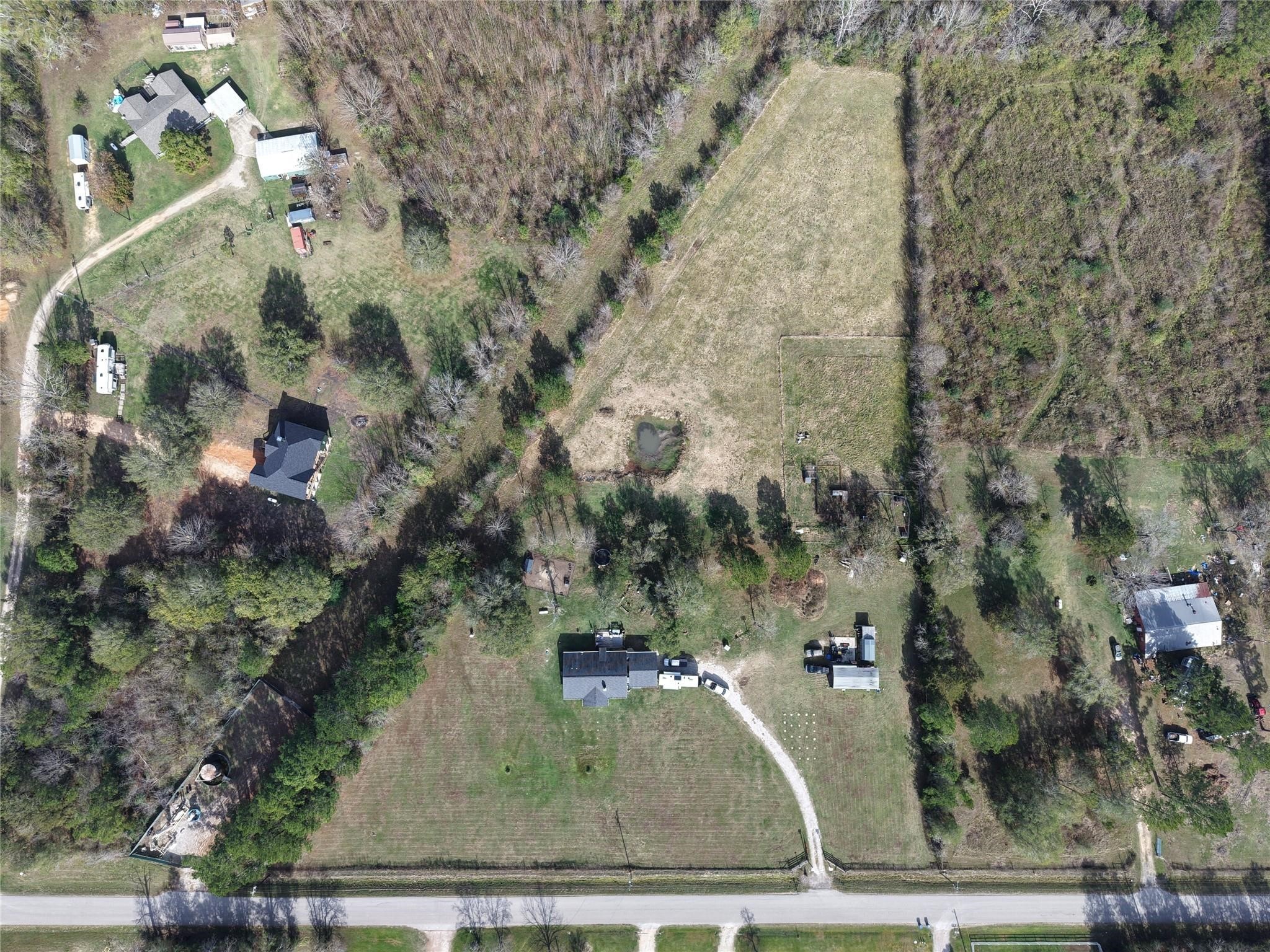 696 Independence Road Shepherd, TX 77371 - Photo 25 of 27 an aerial view of a residential houses with outdoor space