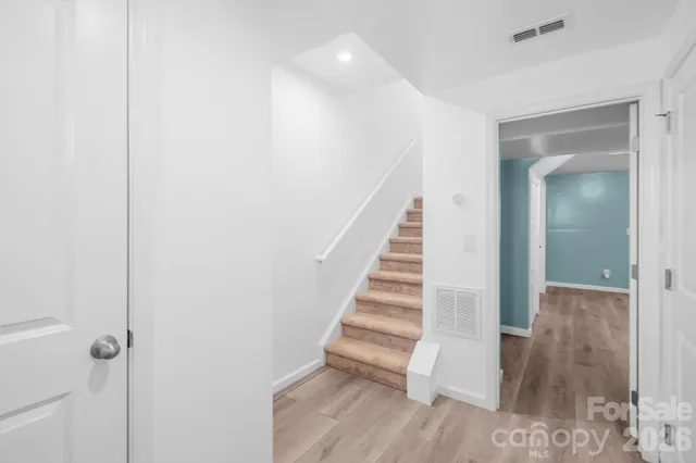 a view of entryway with wooden floor