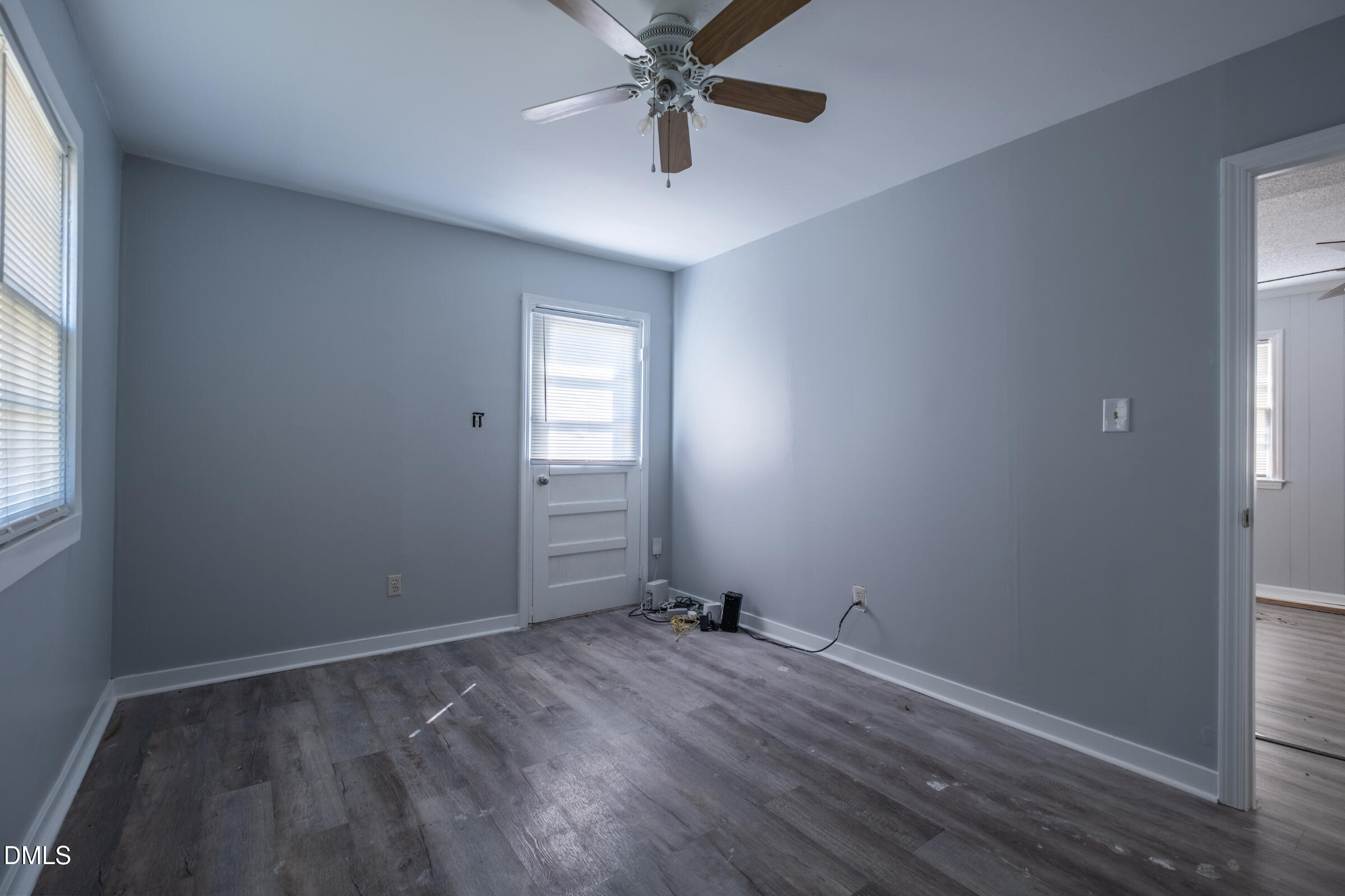 2800 Greenock Drive Raleigh, NC 27604 - Photo 4 of 9 wooden floor in an empty room with a window