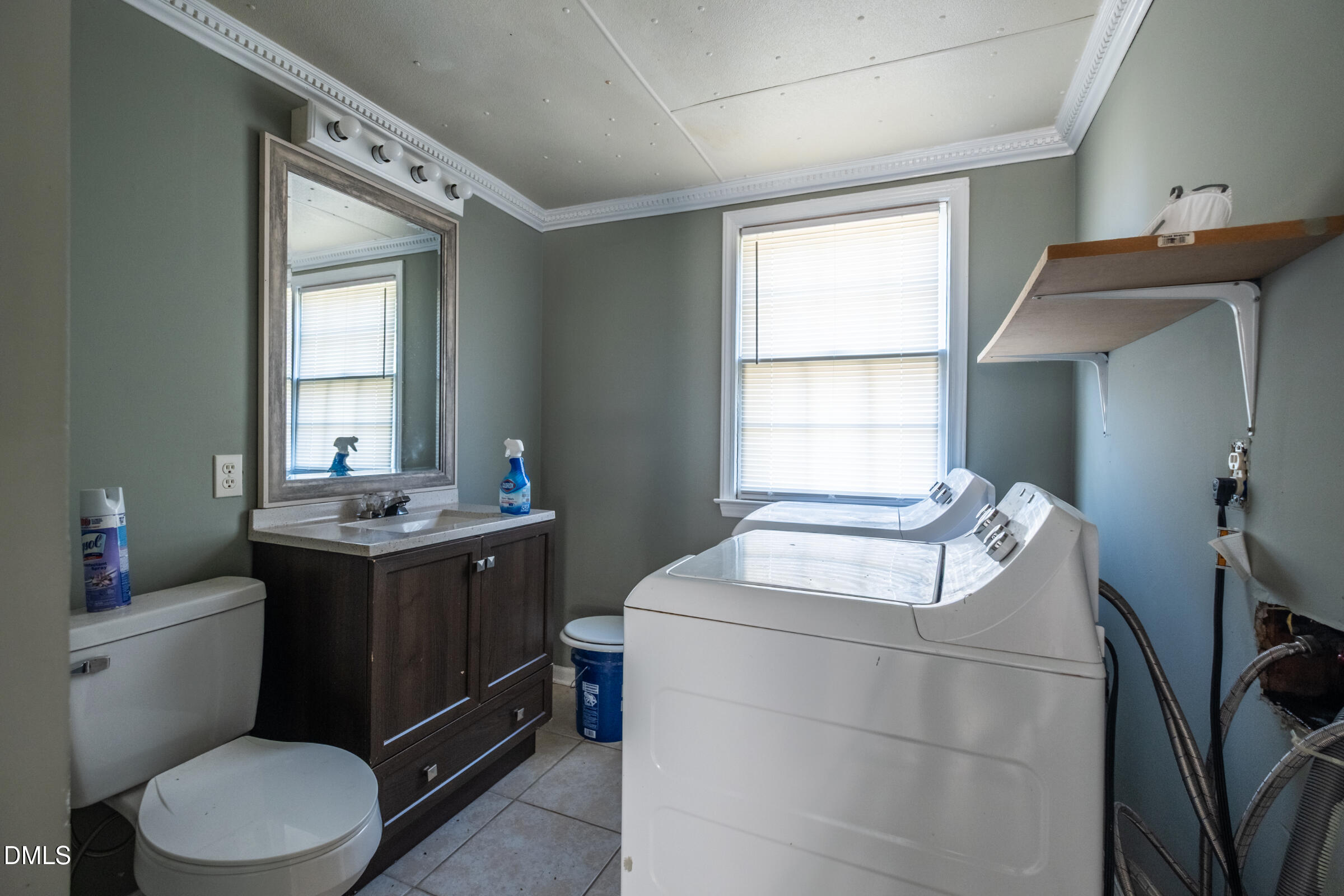 2800 Greenock Drive Raleigh, NC 27604 - Photo 6 of 9 a bathroom with a granite countertop toilet sink and mirror