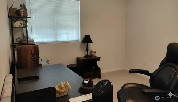 a table and chairs in a room