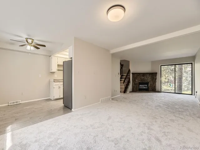 a kitchen with stainless steel appliances a refrigerator sink and stove