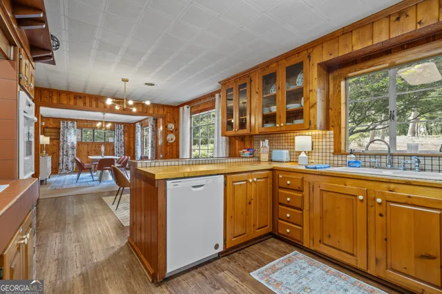 a very nice looking kitchen with a large window
