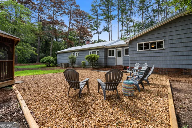 a house view with a garden space