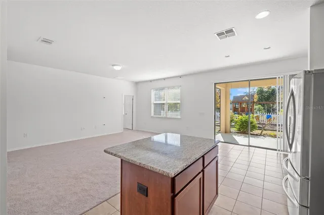 a view of kitchen and utility room