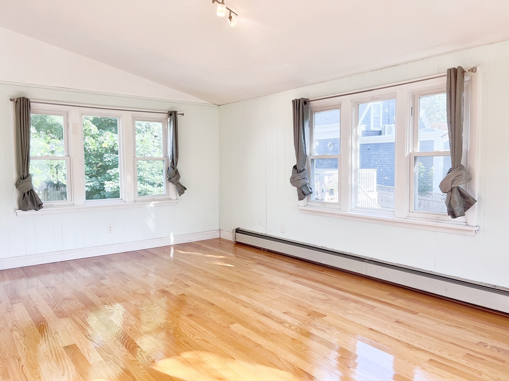 68 Maple Street Melrose, MA 02176 - Photo 16 of 39 a view of an empty room with a window