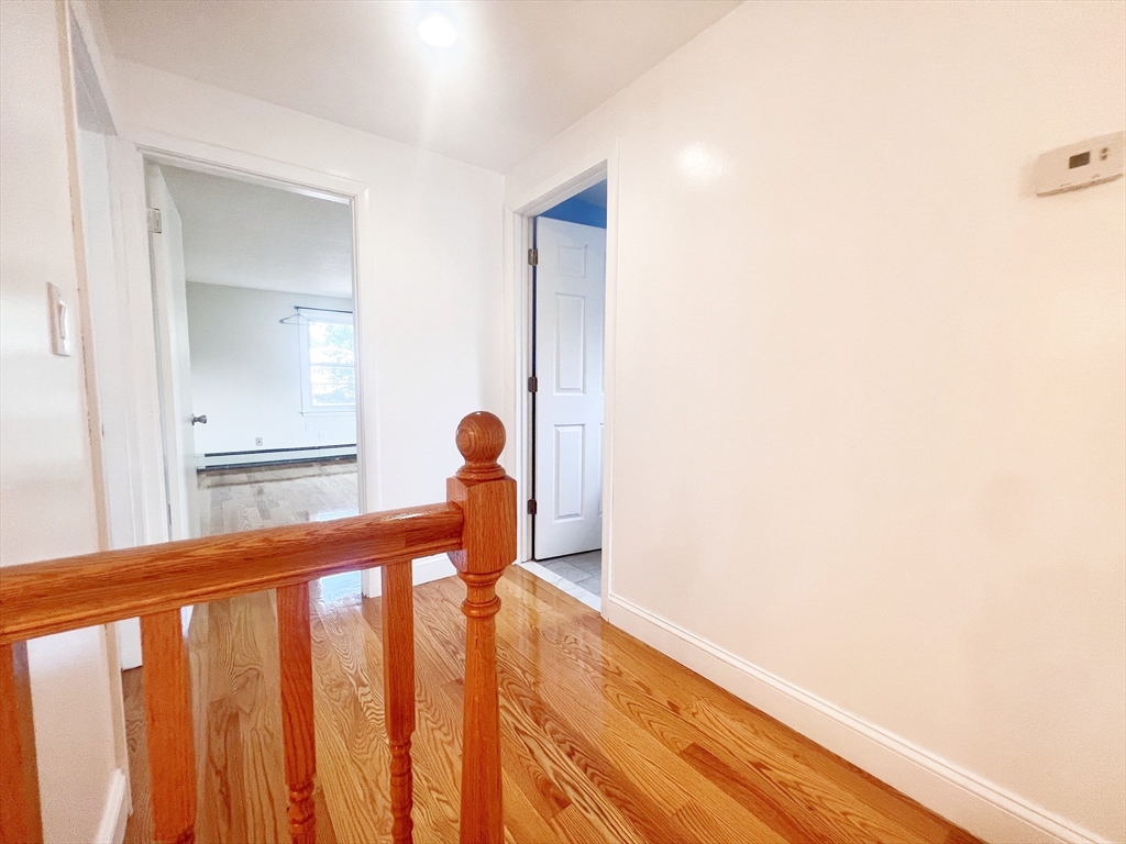 68 Maple Street Melrose, MA 02176 - Photo 20 of 39 a view of staircase with white walls