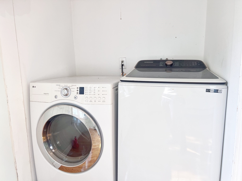 68 Maple Street Melrose, MA 02176 - Photo 37 of 39 a utility room with dryer and washer