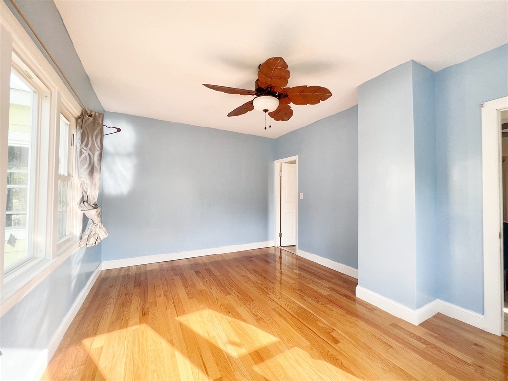 68 Maple Street Melrose, MA 02176 - Photo 7 of 39 a view of room with a ceiling fan