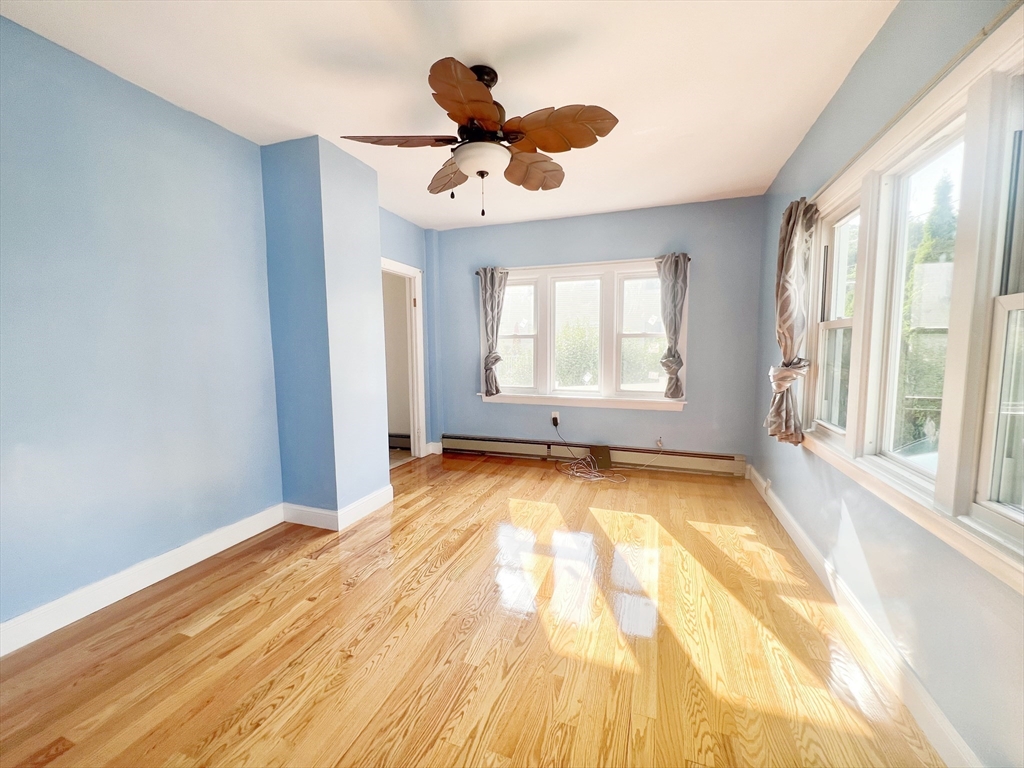 68 Maple Street Melrose, MA 02176 - Photo 8 of 39 a view of an empty room and window