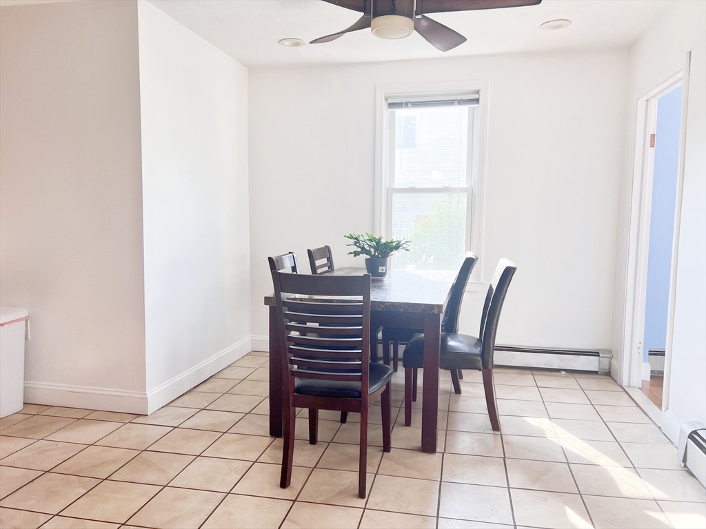 68 Maple Street Melrose, MA 02176 - Photo 10 of 39 a view of a dining room with furniture