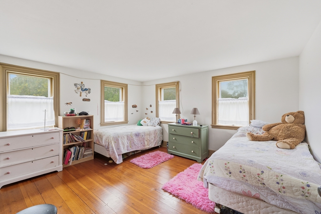 21 Rocky Hill Road Andover, MA 01810 - Photo 15 of 35 a bedroom with a bed and a closet