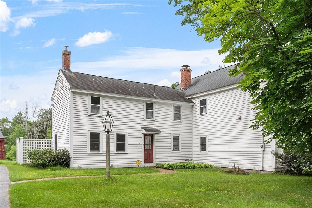 21 Rocky Hill Road Andover, MA 01810 - Photo 21 of 35 a front view of house with yard and green space