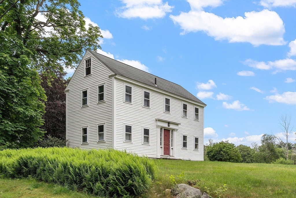 21 Rocky Hill Road Andover, MA 01810 - Photo 23 of 35 a front view of a house with a yard