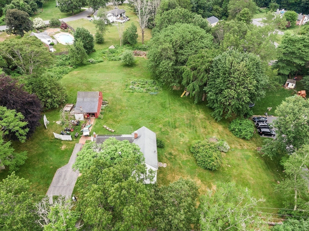 21 Rocky Hill Road Andover, MA 01810 - Photo 26 of 35 a backyard of a house with a yard and lake view