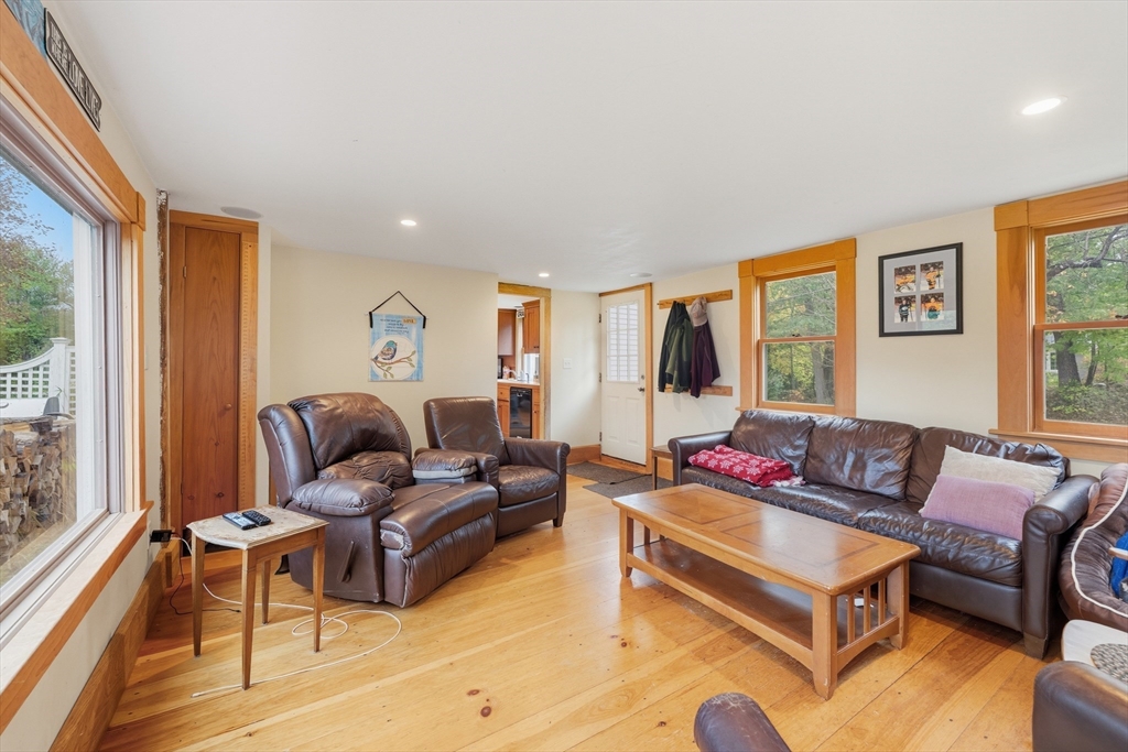 21 Rocky Hill Road Andover, MA 01810 - Photo 4 of 35 a living room with furniture and a large window