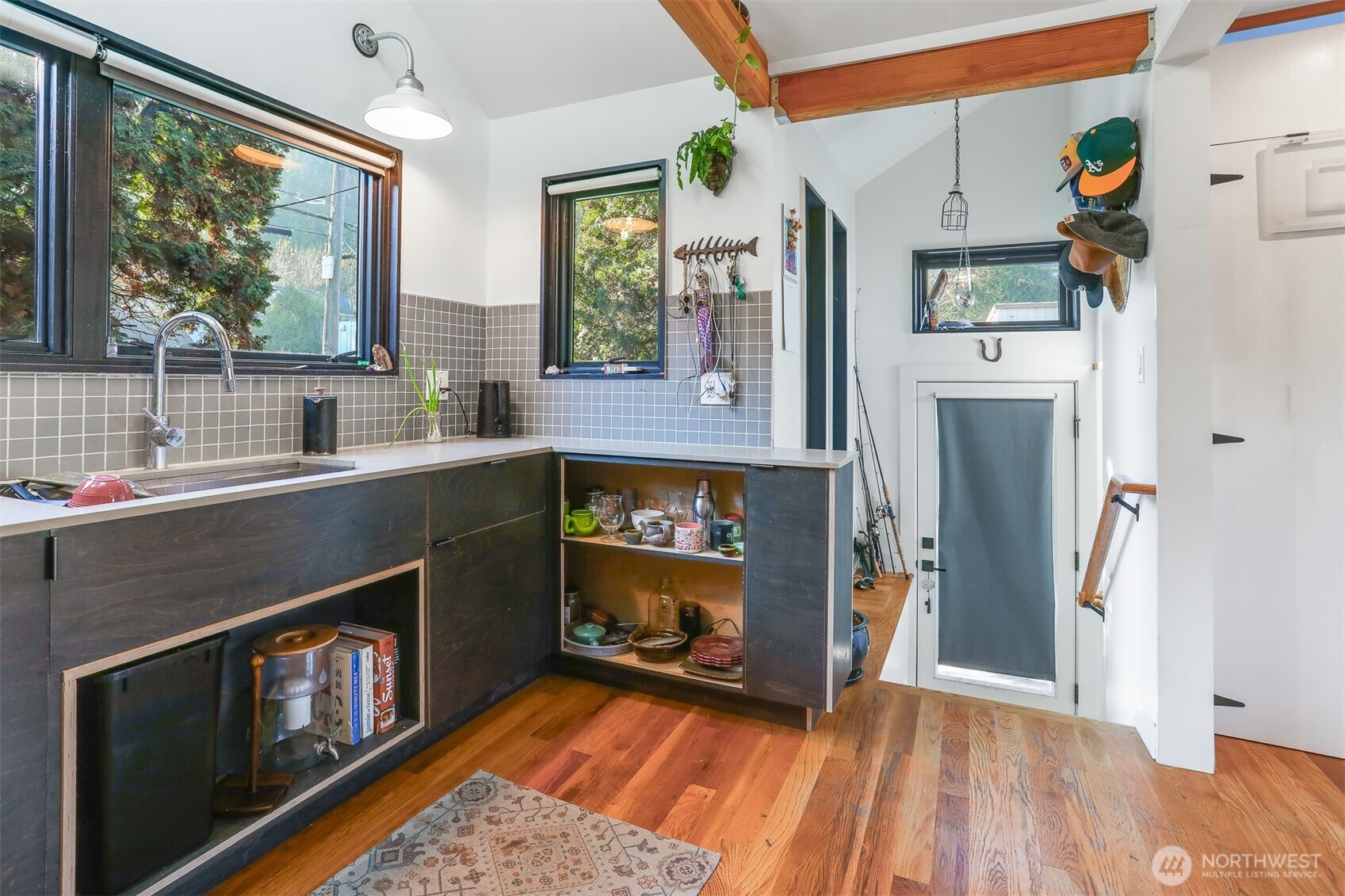 3868 16th Avenue Southwest Seattle, WA 98106 - Photo 29 of 37 a kitchen with a refrigerator and a sink
