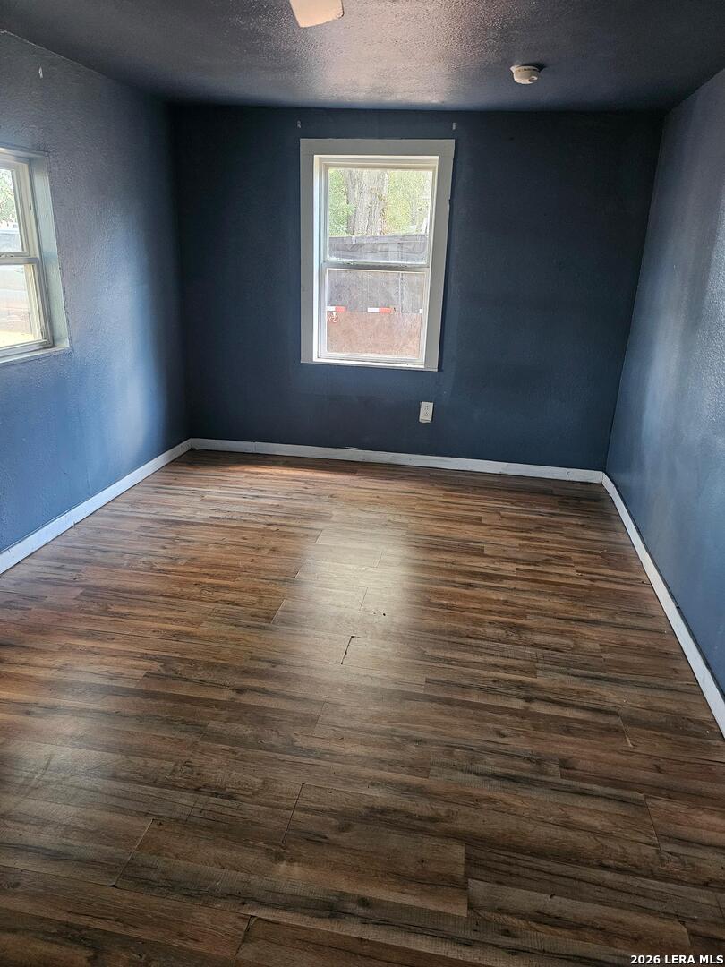 701 Roosevelt Street Longview, TX 75601 - Photo 5 of 8 a view of empty room with window