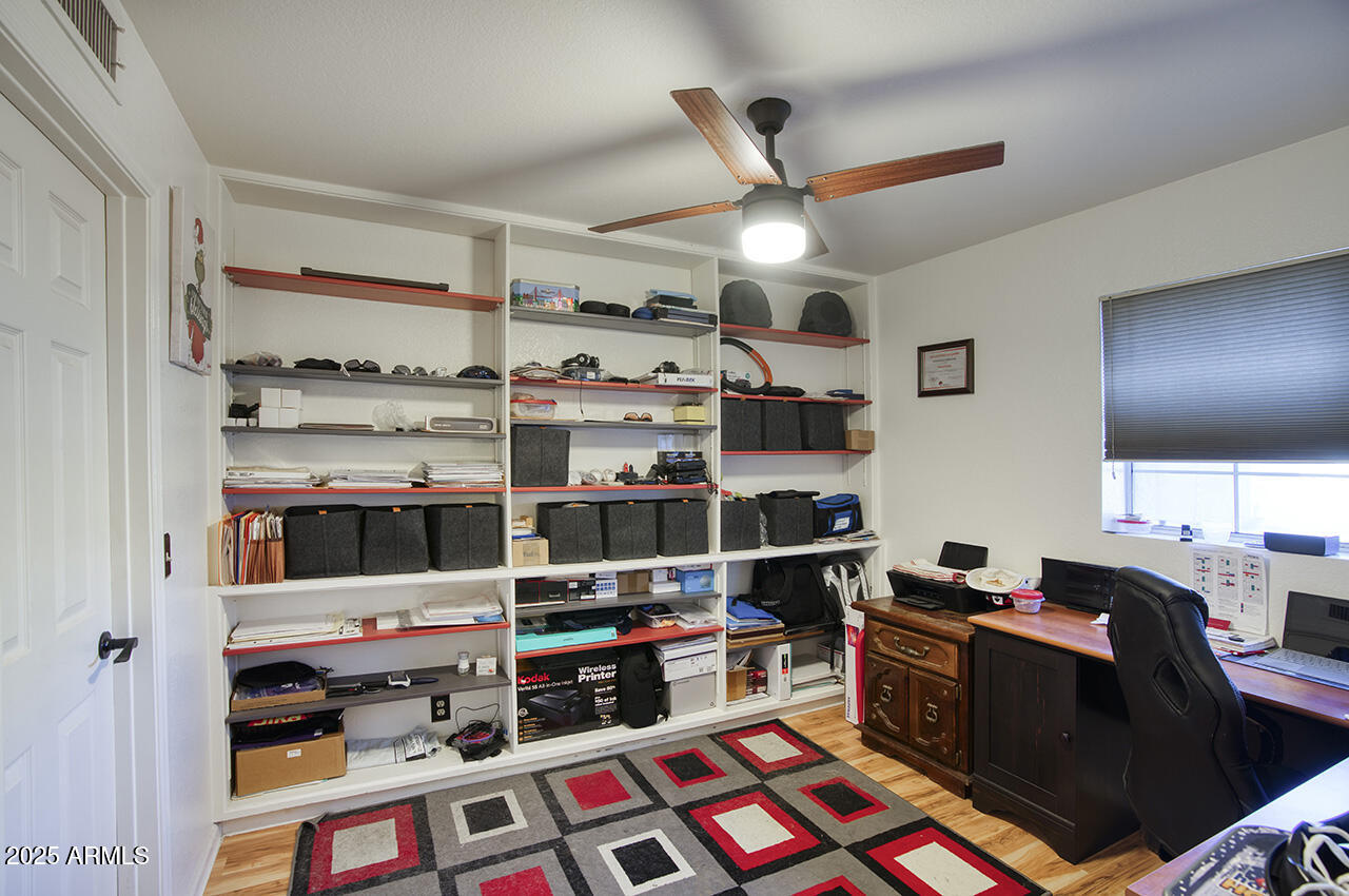 12677 North 77th Drive Peoria, AZ 85381 - Photo 11 of 25 a room with storage and utility