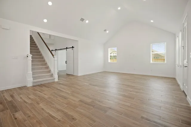 a bathroom with a toilet a sink and a mirror