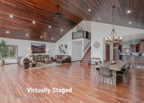 a view of livingroom with furniture and wooden floor