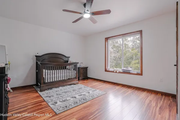 a room with furniture and wooden floor