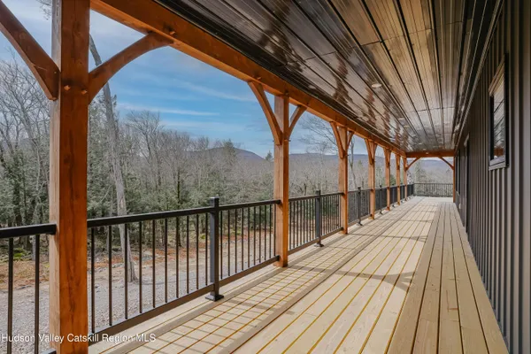 a view of a house with a yard and garage