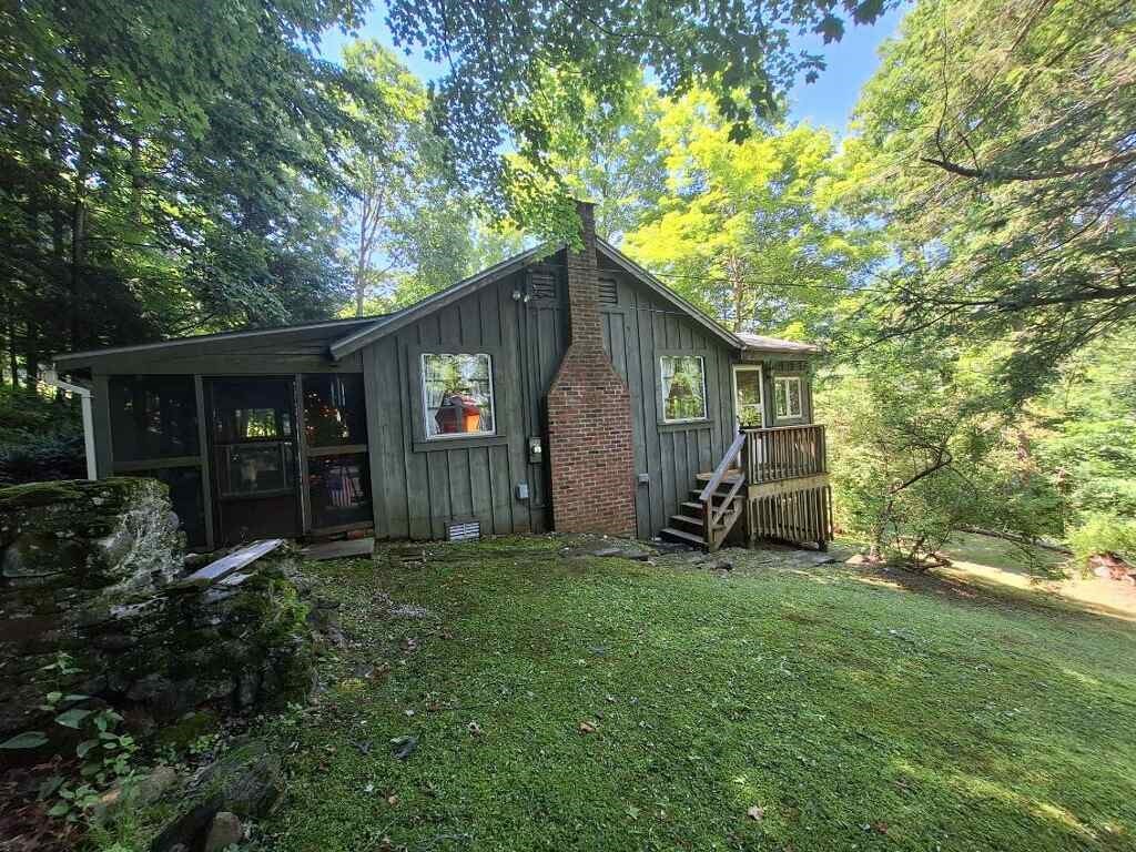 14 Mahkeenac Road Stockbridge, MA 01262 - Photo 1 of 28 a view of a house with backyard and garden