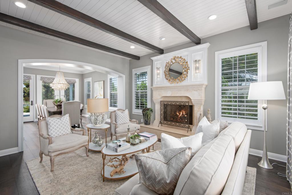 7919 Corte Penca Carlsbad, CA 92009 - Photo 3 of 7 a living room with furniture and a fireplace