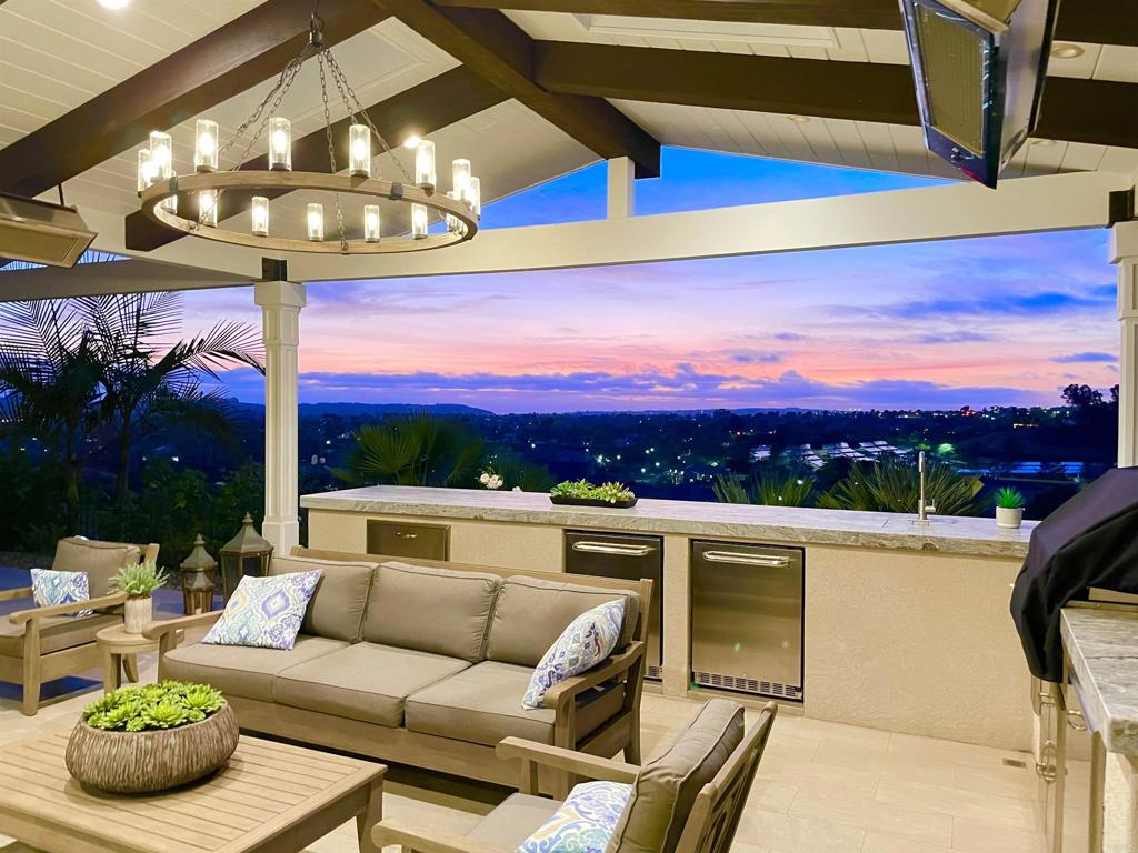 7919 Corte Penca Carlsbad, CA 92009 - Photo 6 of 7 a view of a chairs and table in patio