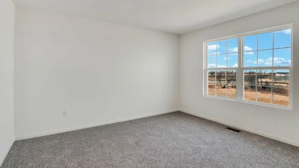 an empty room with a window