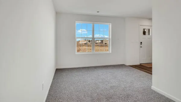 an empty room with windows