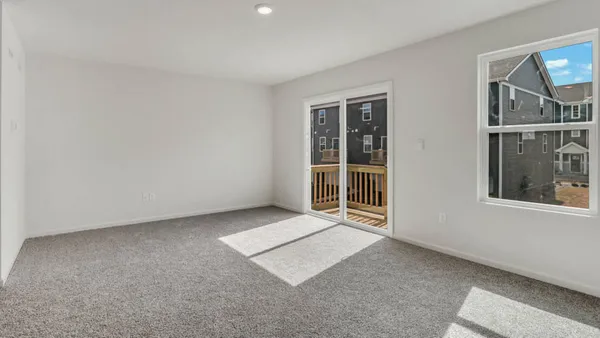 an empty room with windows