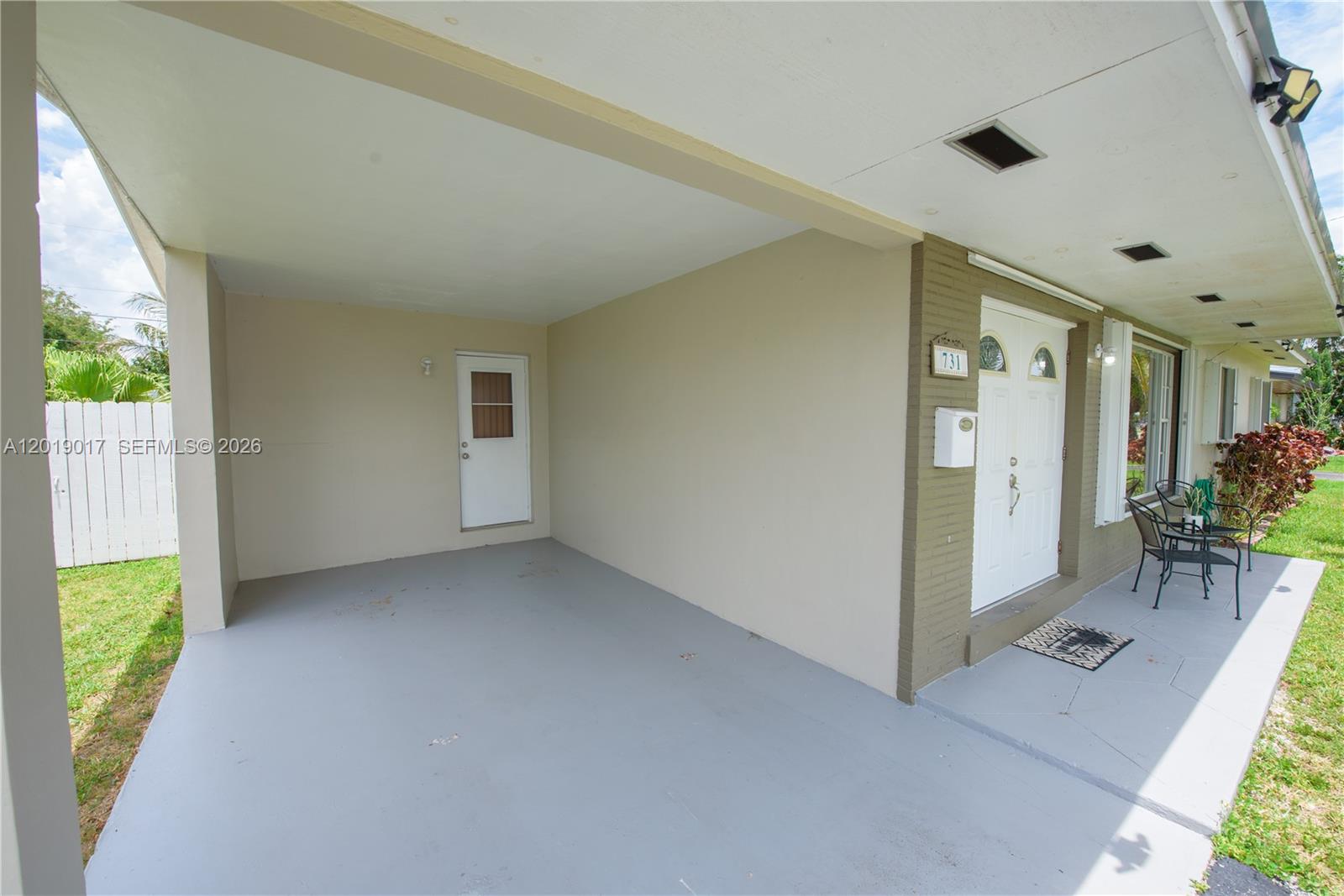731 Northwest 17th Street Homestead, FL 33030 - Photo 19 of 29 en empty room with windows