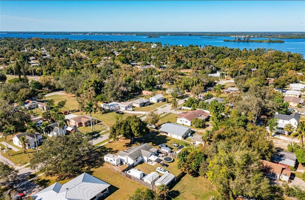 318 Bellair Road Fort Myers, FL 33905 - Photo 19 of 29 an aerial view of a house with a yard