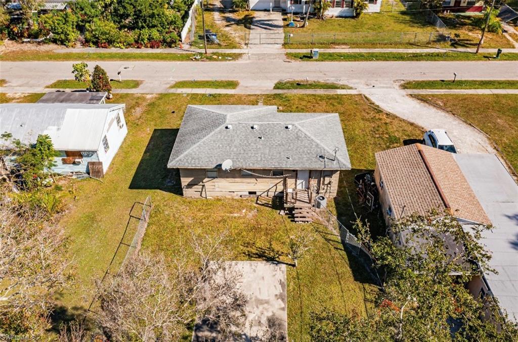 318 Bellair Road Fort Myers, FL 33905 - Photo 21 of 29 a view of a swimming pool with an outdoor space and seating area