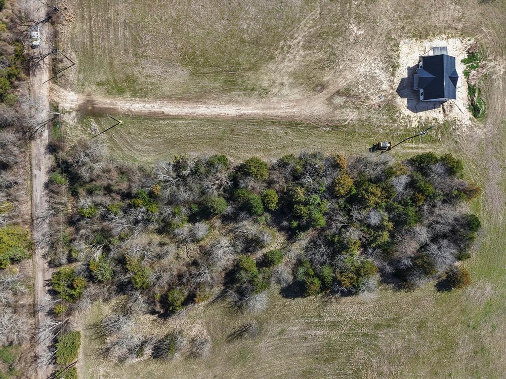 Tbd Avenue East Point, TX 75472 - Photo 5 of 10 a view of a dry yard with wooden fence