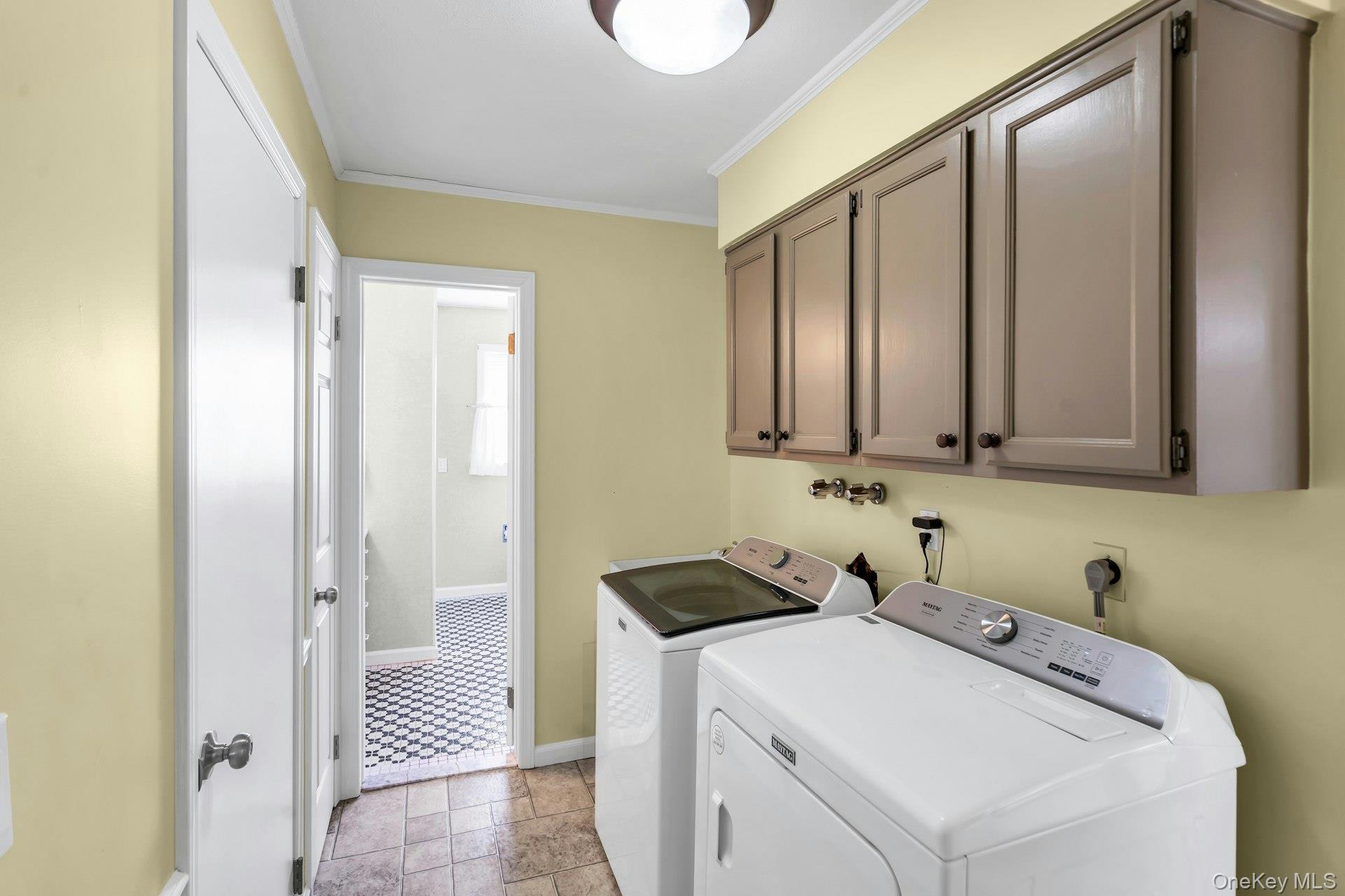 5845 North Bayview Road Southold, NY 11971 - Photo 12 of 24 Dedicated laundry space with plenty of storage