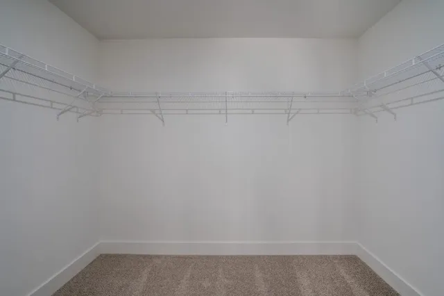a view of a room with racks on the wall