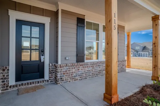 a view of an entryway with a door