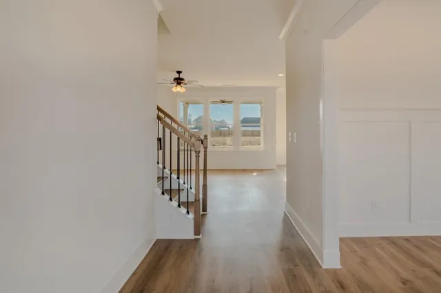 a view of entryway with wooden floor