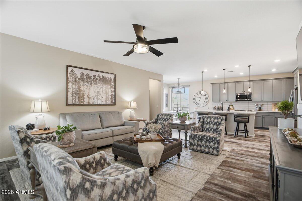 6150 North Stratford Court Rimrock, AZ 86335 - Photo 11 of 60 a living room with lots of furniture and view of kitchen
