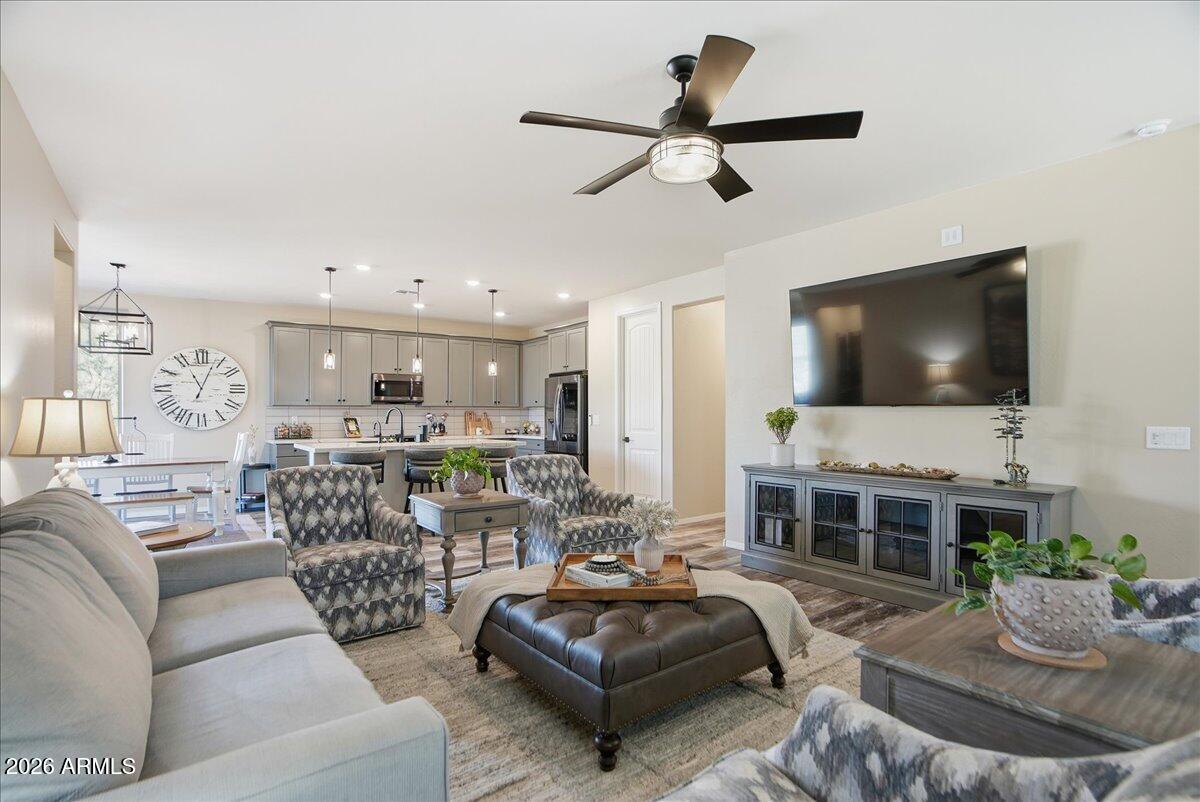 6150 North Stratford Court Rimrock, AZ 86335 - Photo 12 of 60 a living room with furniture and a flat screen tv