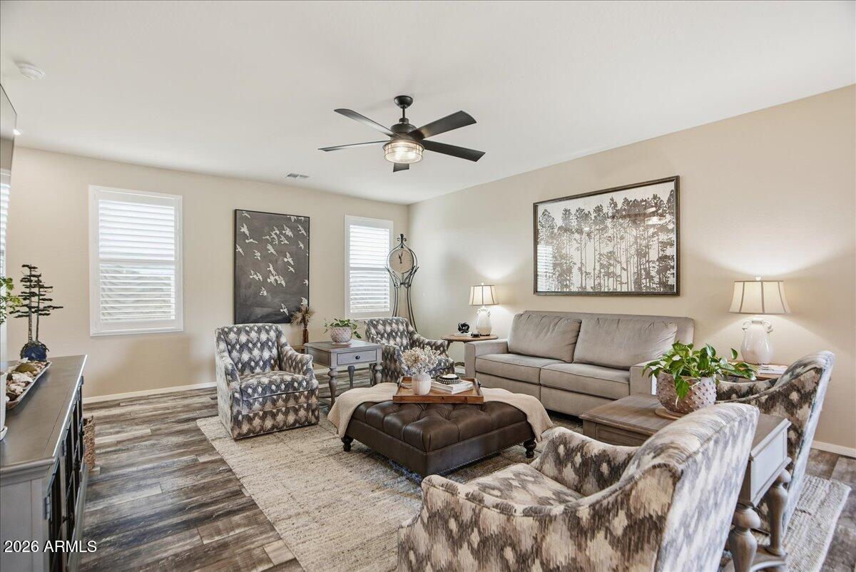 6150 North Stratford Court Rimrock, AZ 86335 - Photo 13 of 60 a living room with furniture and a large window