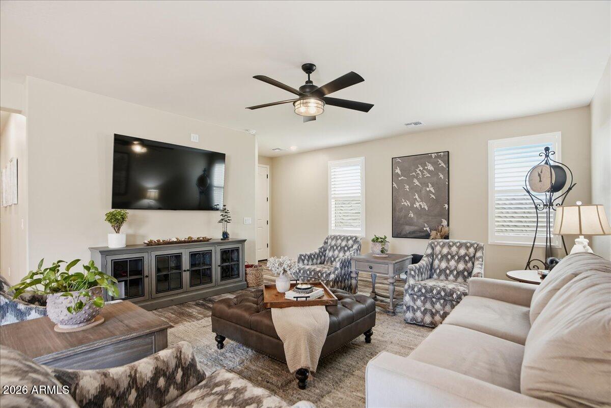 6150 North Stratford Court Rimrock, AZ 86335 - Photo 14 of 60 a living room with furniture and a flat screen tv