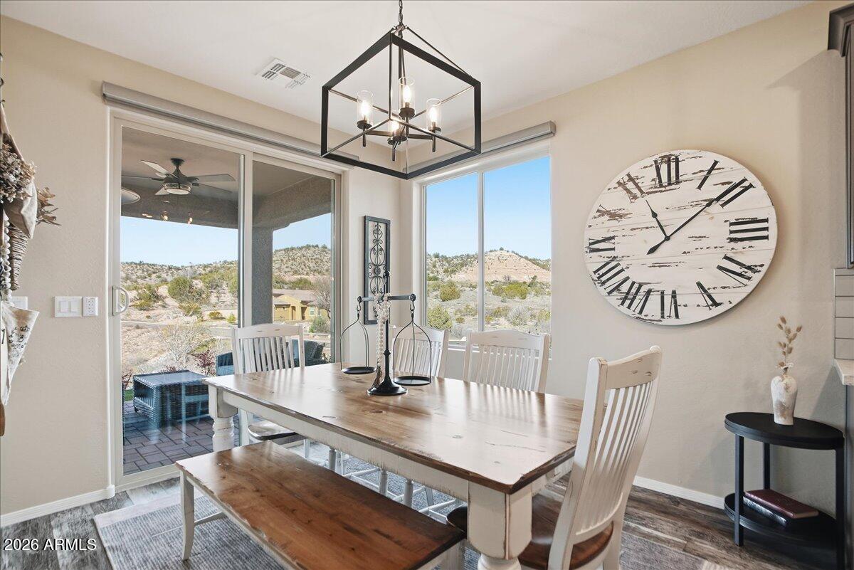 6150 North Stratford Court Rimrock, AZ 86335 - Photo 21 of 60 a view of a dining room with furniture window and outside view