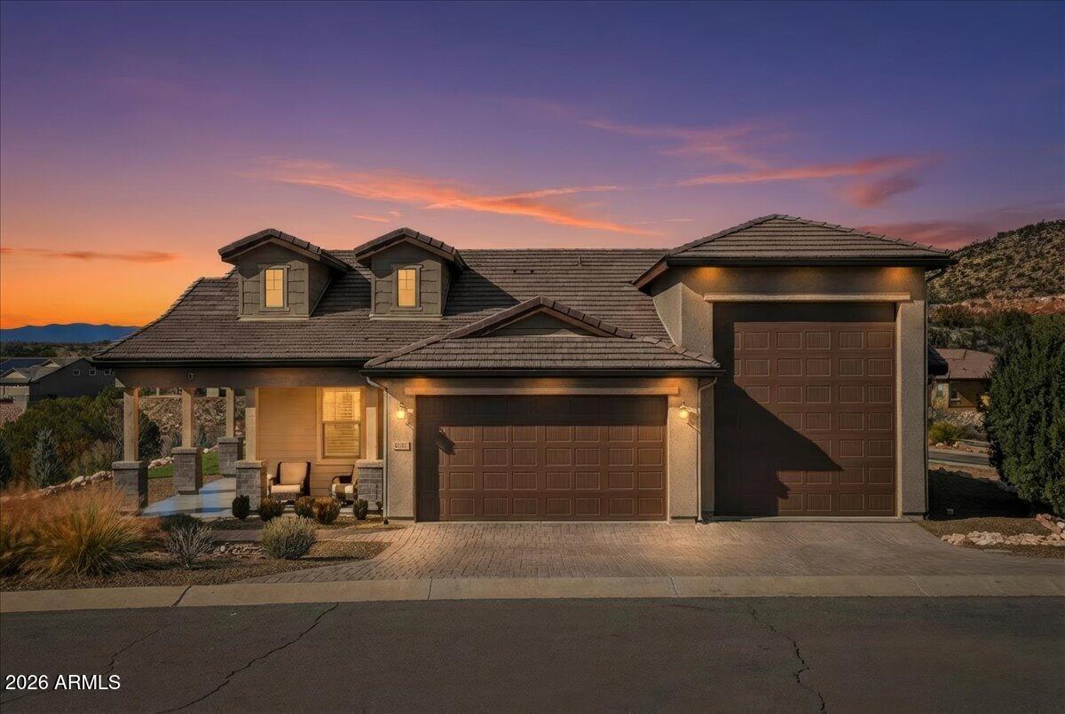 6150 North Stratford Court Rimrock, AZ 86335 - Photo 3 of 60 a front view of a house with a yard and garage
